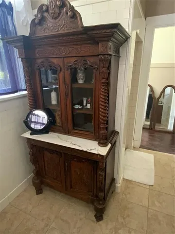 a view of cabinets and chandelier