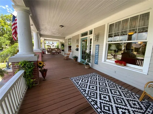 a view of a swimming pool with a patio