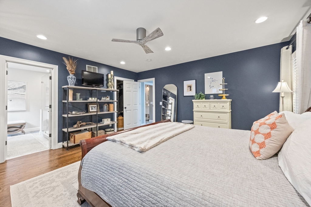 26 West Way Mashpee, MA 02649 - Photo 12 of 42 a bedroom with a bed furniture and a book shelf