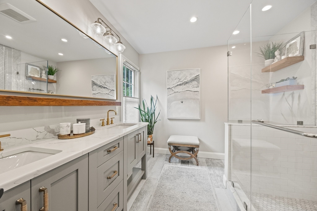 26 West Way Mashpee, MA 02649 - Photo 14 of 42 a spacious bathroom with a granite countertop sink mirror and double