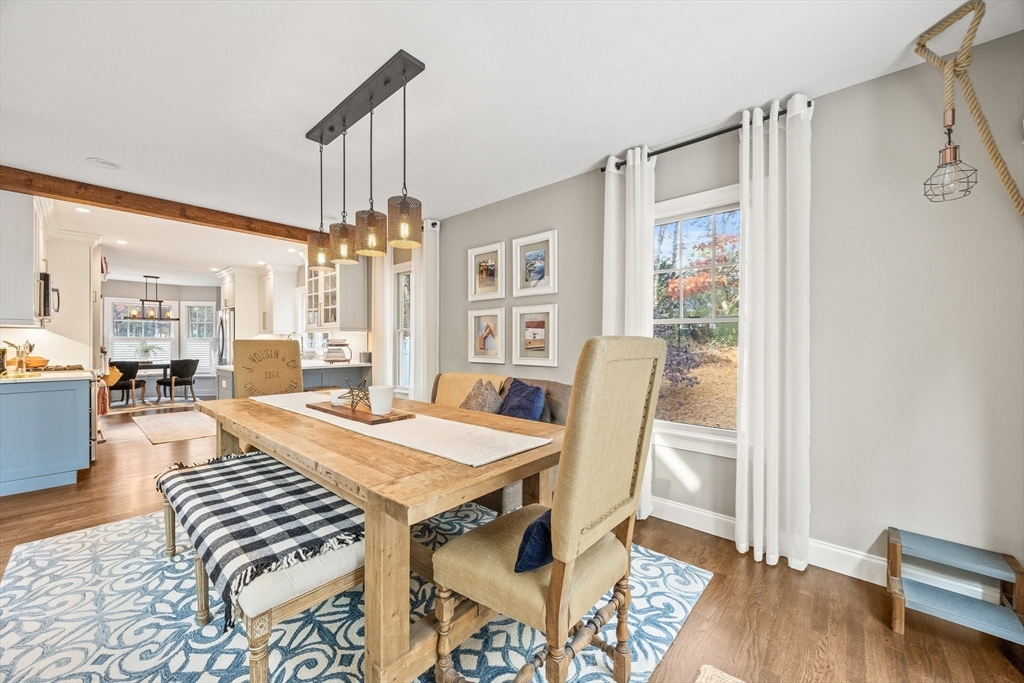 26 West Way Mashpee, MA 02649 - Photo 17 of 42 a view of a dining room with furniture and wooden floor