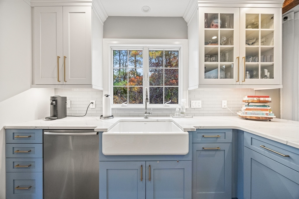 26 West Way Mashpee, MA 02649 - Photo 20 of 42 a kitchen with stainless steel appliances granite countertop a sink and a cabinets