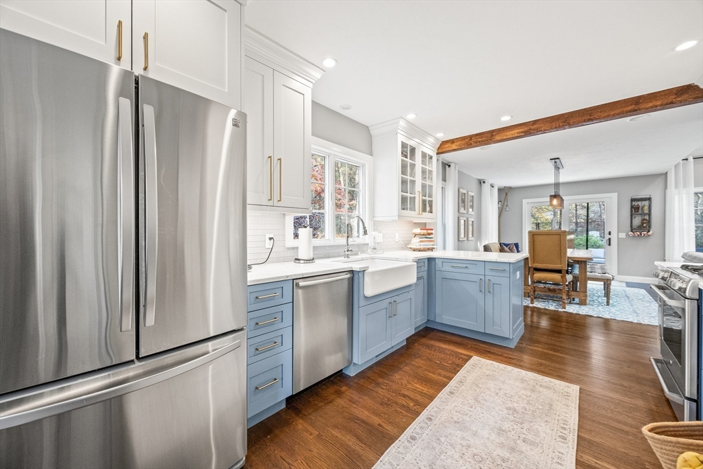 26 West Way Mashpee, MA 02649 - Photo 22 of 42 a large kitchen with a sink stainless steel appliances and cabinets