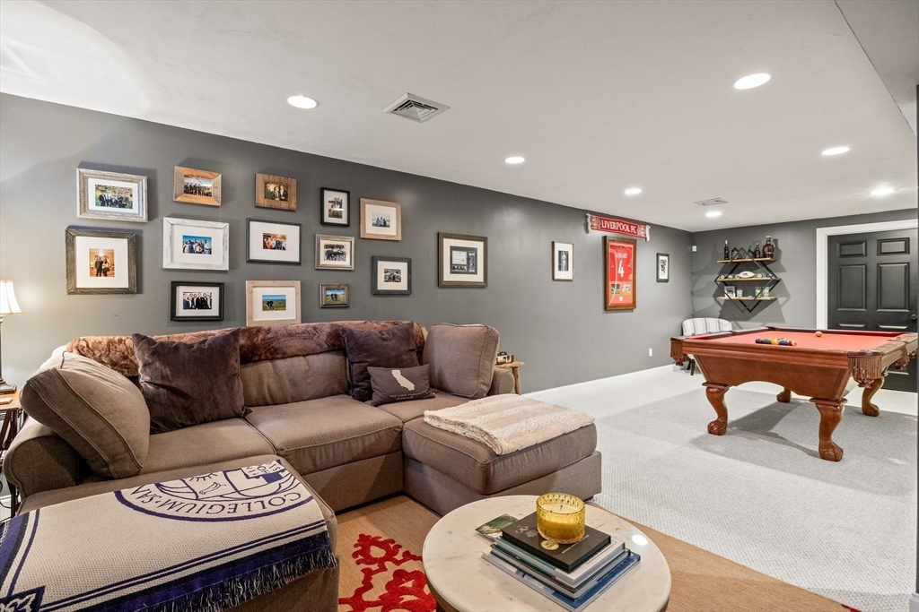 26 West Way Mashpee, MA 02649 - Photo 31 of 42 a living room with furniture and a rug