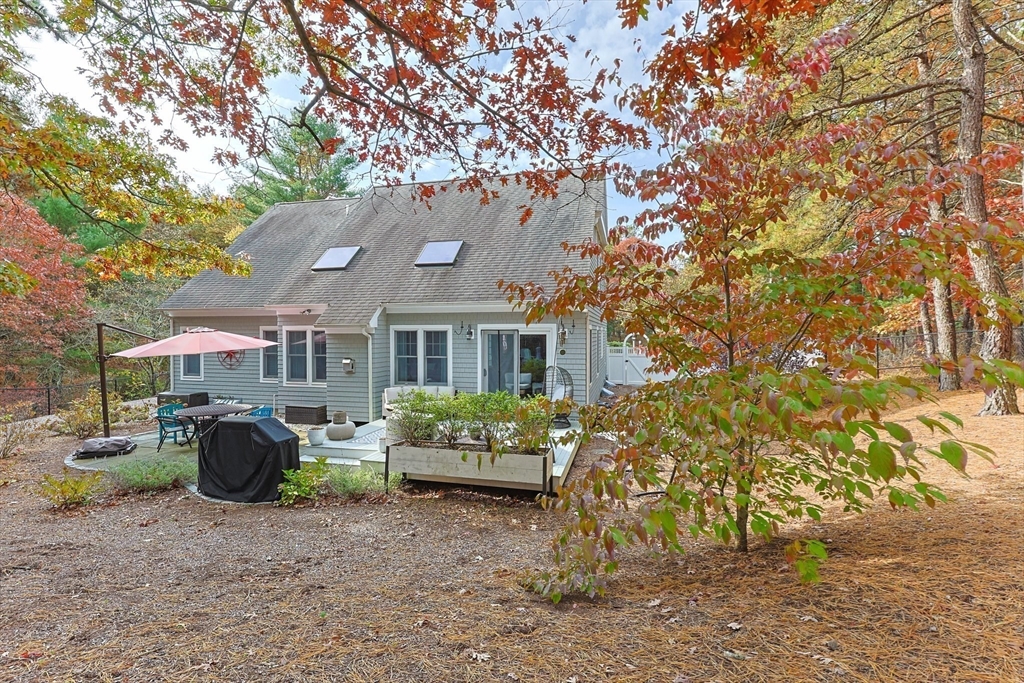 26 West Way Mashpee, MA 02649 - Photo 34 of 42 a front view of a house with garden