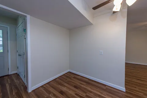 a view of small space with wooden floor
