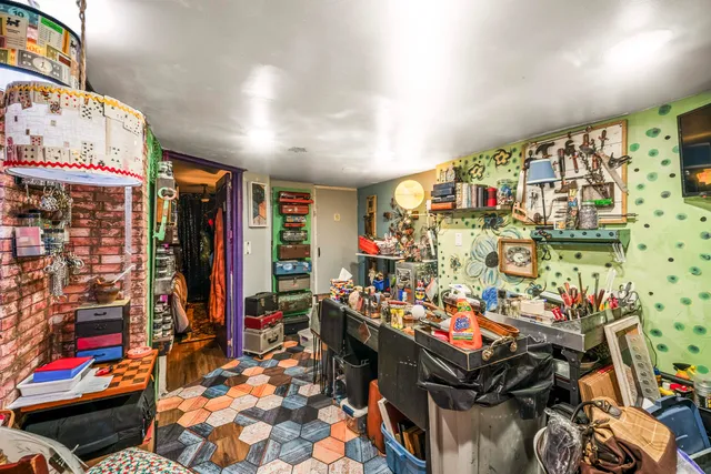 a bed room with a bed and a couch