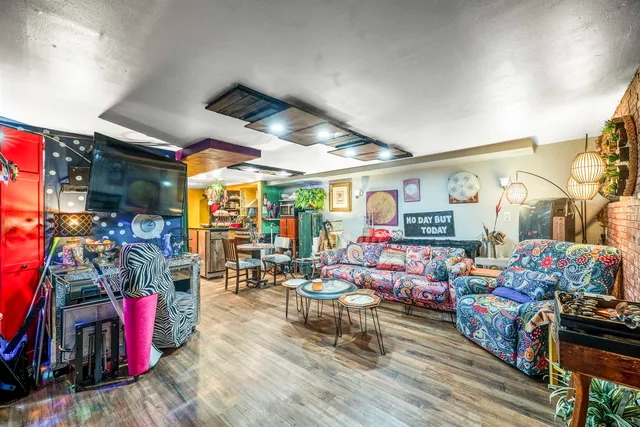 a living room with lots of furniture