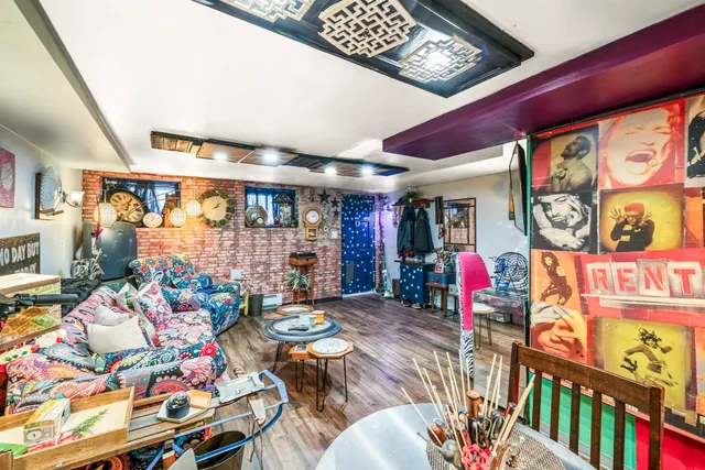 a outdoor living space with furniture and rug