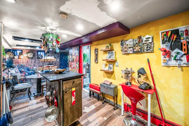 a kitchen with stainless steel appliances granite countertop a stove and cabinets