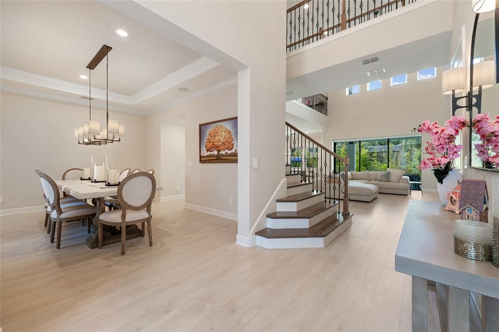 10175 Brocksport Circle Gotha, FL 34734 - Photo 2 of 54 a view of a dining room with furniture