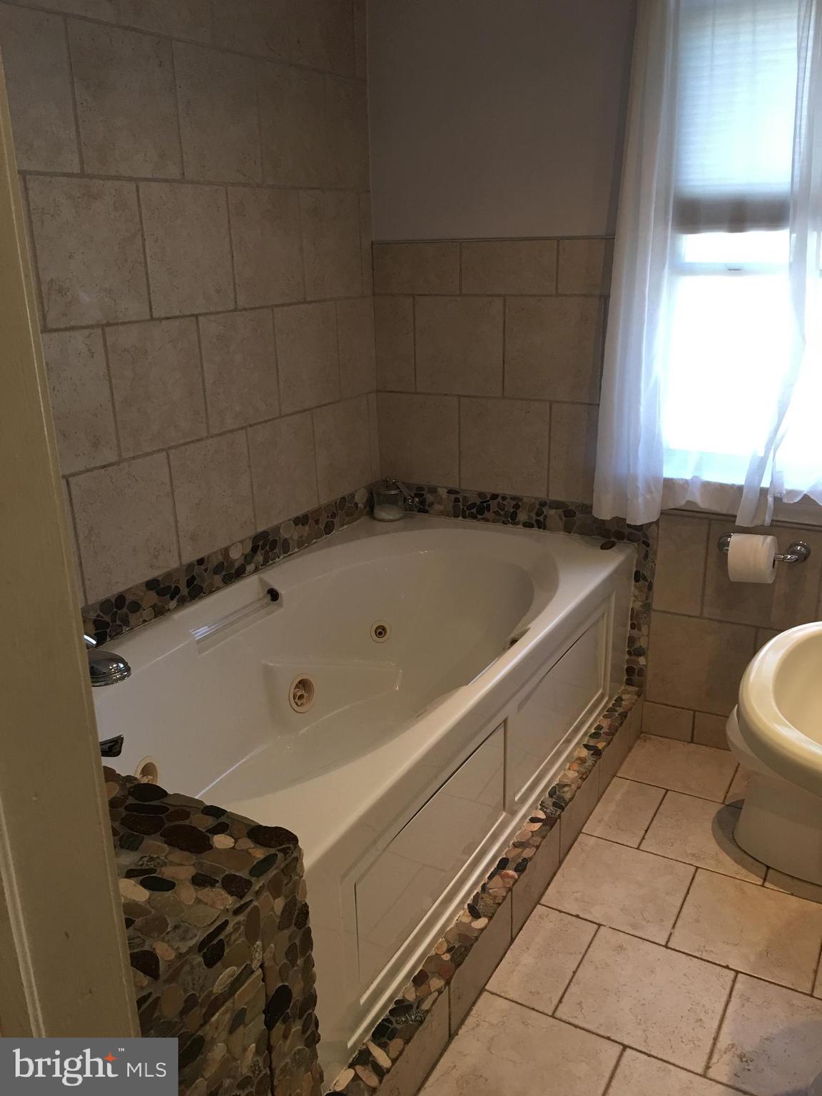 1503 Ralworth Road Baltimore, MD 21218 - Photo 20 of 28 Upper Bathroom w/ Jacuzzi Tub