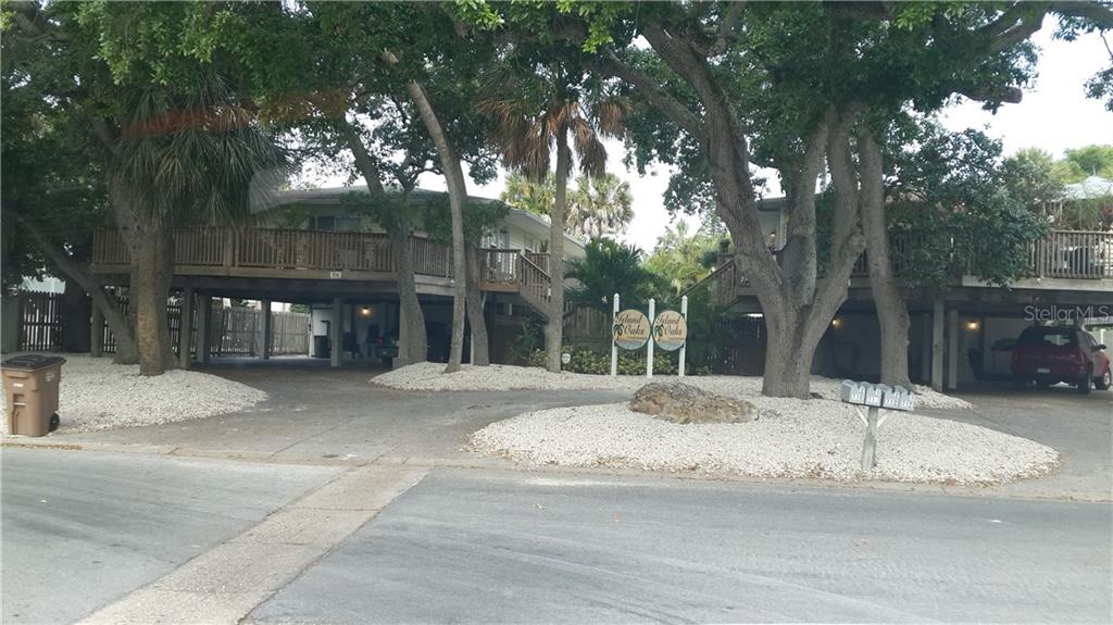 712 1st Street Indian Rocks Beach, FL 33785 - Photo 1 of 1 710 on the left (south building) and 712 on the right (north building) with plenty of parking under the balconies on the #1 unit in each building. Each unit has its own ground-level storage space, with washer and dryer hook-ups in each unit.