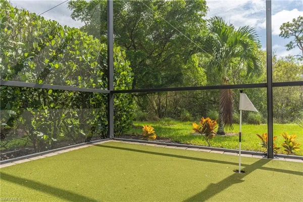 a view of a swimming pool and a patio