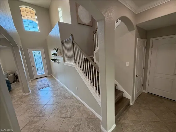 a view of a hallway with staircase