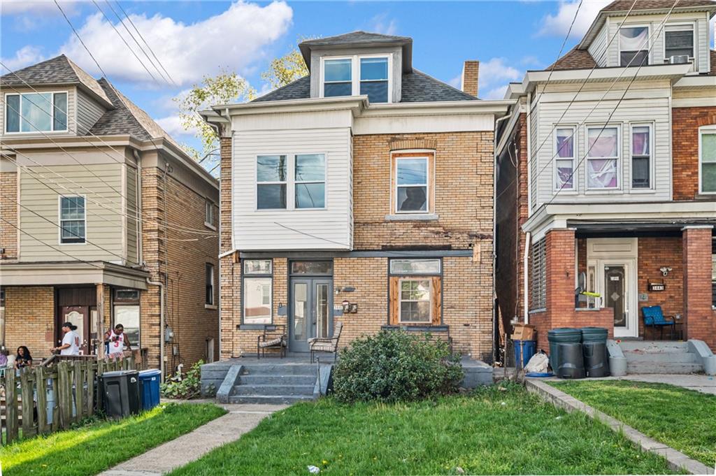 3441 Fleming Avenue Pittsburgh, PA 15212 - Photo 2 of 6 a front view of a house with garden