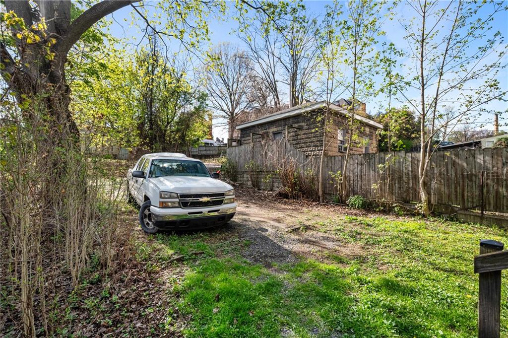3441 Fleming Avenue Pittsburgh, PA 15212 - Photo 4 of 6 a car parked in front of a house