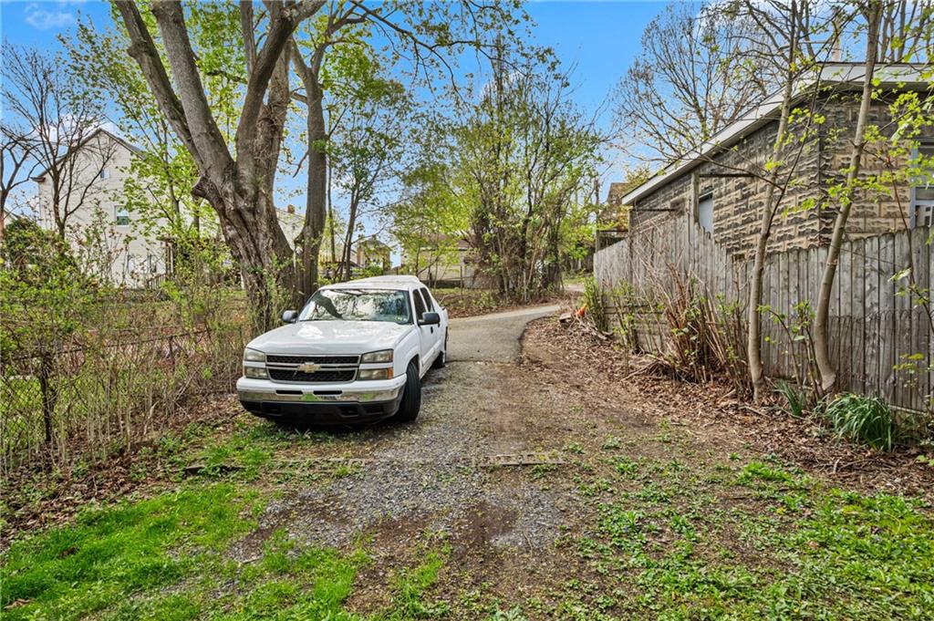 3441 Fleming Avenue Pittsburgh, PA 15212 - Photo 5 of 6 a view of a small yard in front of a house