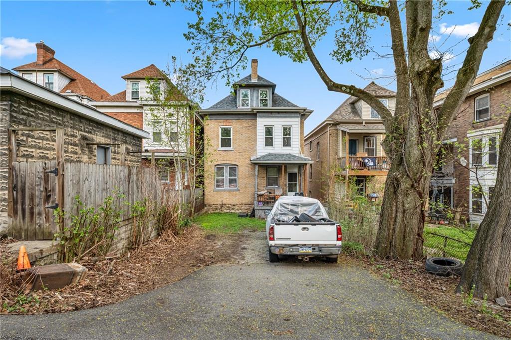 3441 Fleming Avenue Pittsburgh, PA 15212 - Photo 6 of 6 a car parked in front of a house