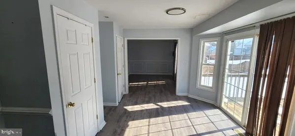 a kitchen with a stove microwave and sink