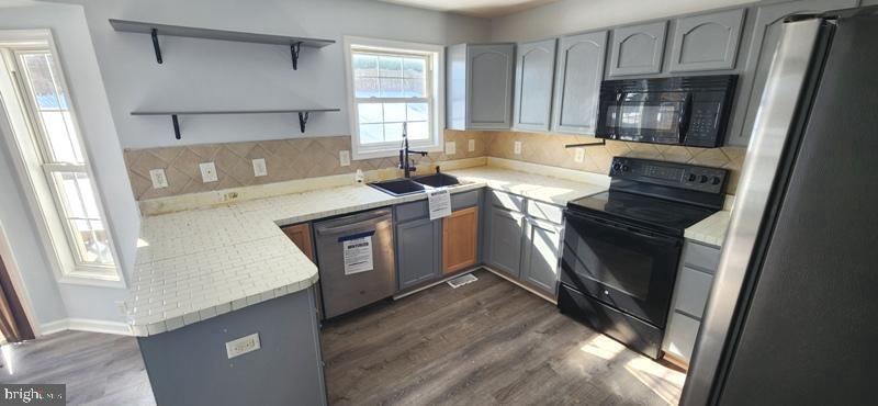351 Thumper Drive Ranson, WV 25438 - Photo 10 of 44 a kitchen with a stove microwave and sink