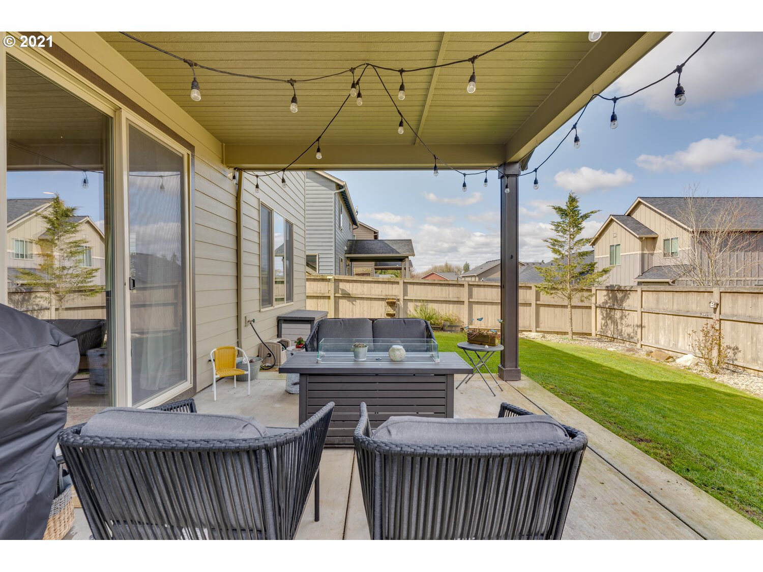 2314 South Wind River Way Ridgefield, WA 98642 - Photo 16 of 19 a view of a patio with a table and chairs