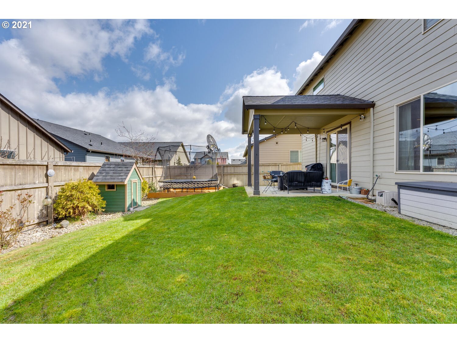 2314 South Wind River Way Ridgefield, WA 98642 - Photo 17 of 19 a view of a house with backyard and porch
