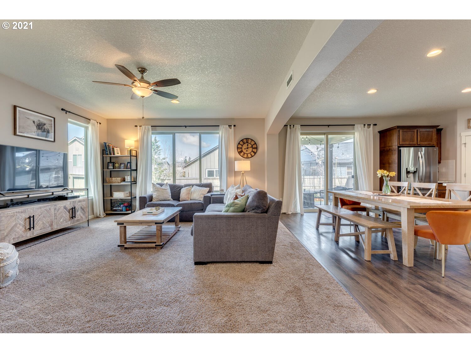 2314 South Wind River Way Ridgefield, WA 98642 - Photo 4 of 19 a living room with furniture and a large window