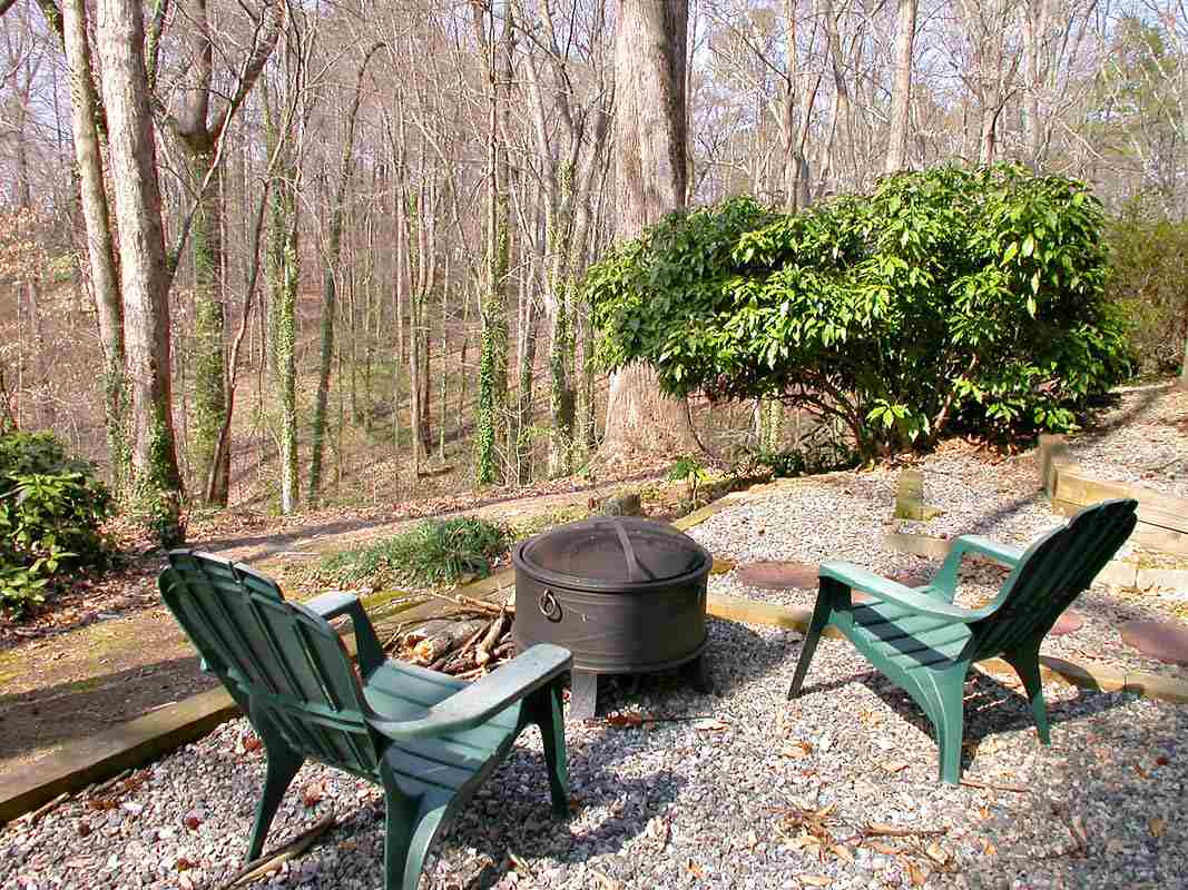 4709 Wedgewood Street Raleigh, NC 27612 - Photo 3 of 25 There is nothing better than a relaxing backyard new stone tile patio. How can you resist?! Patio/Deck