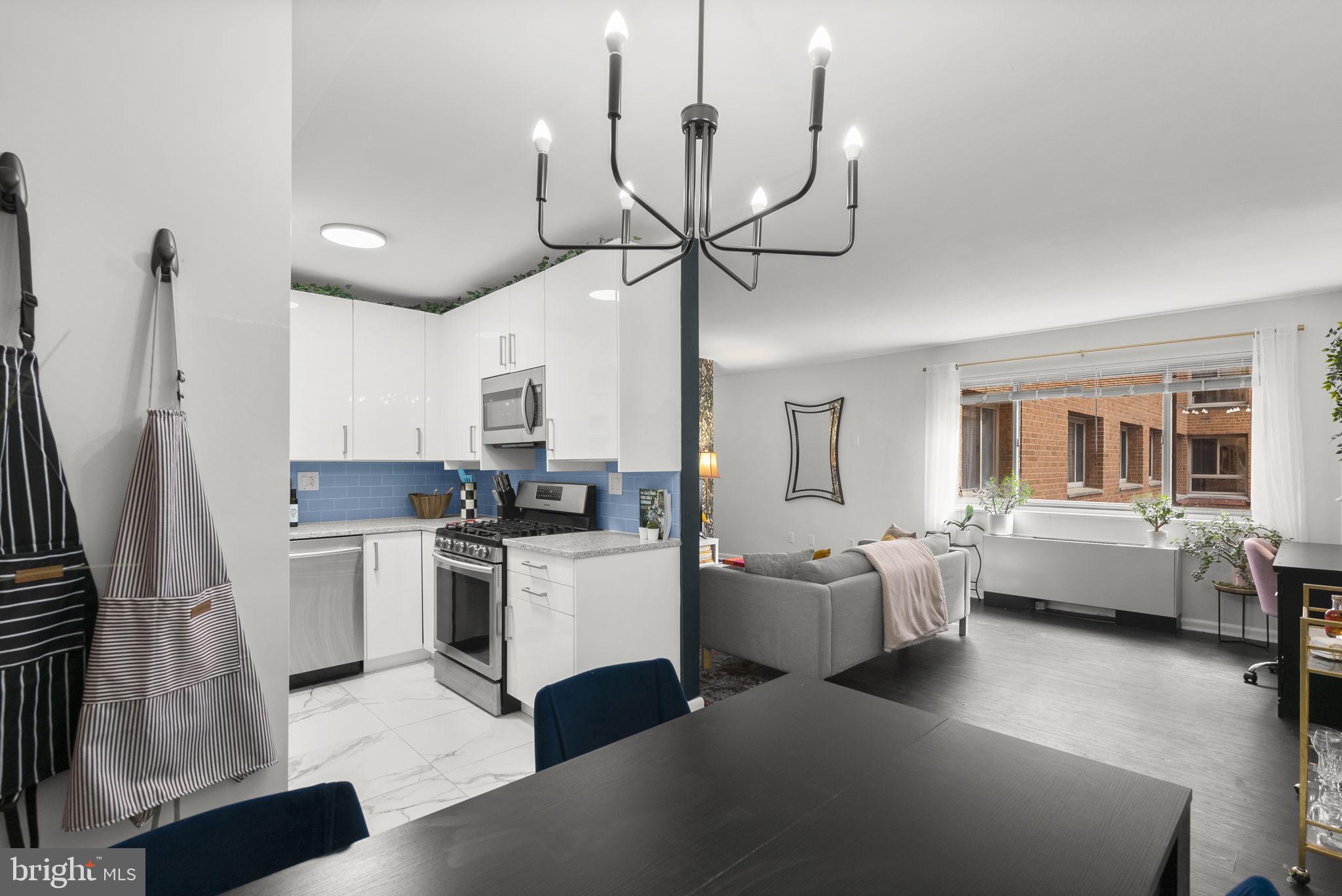 3900 Tunlaw Road Northwest, Unit 101 Washington, DC 20007 - Photo 17 of 28 Kitchen has been opened to the Dining Room