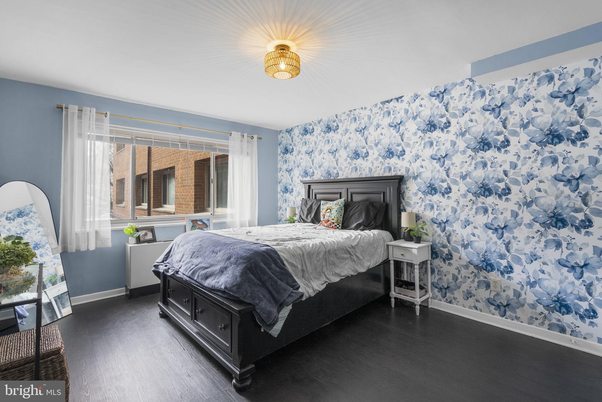 3900 Tunlaw Road Northwest, Unit 101 Washington, DC 20007 - Photo 18 of 28 Spacious Primary Bedroom with large picture window