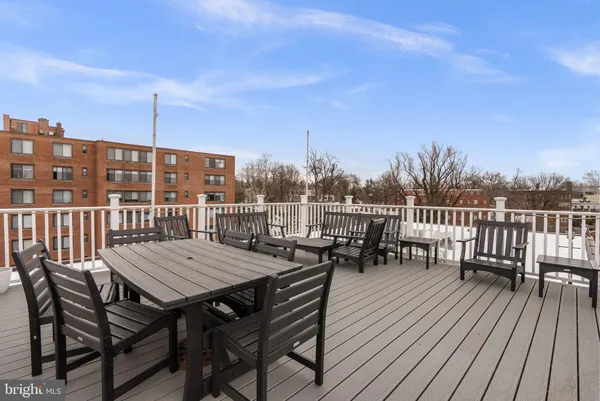 a view of a chairs and table in the patio