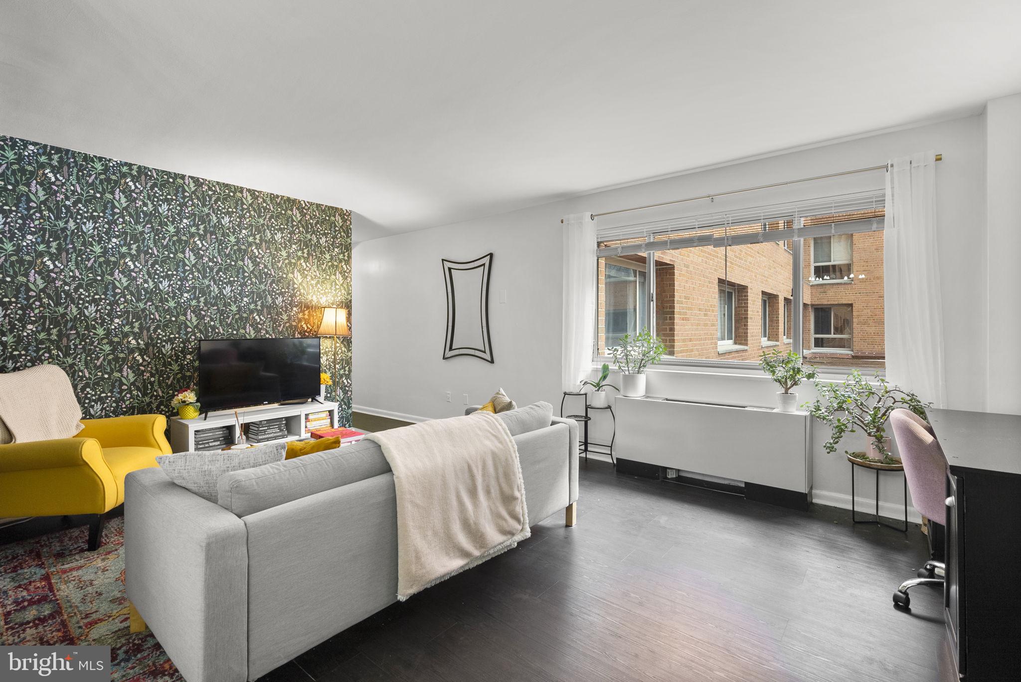 3900 Tunlaw Road Northwest, Unit 101 Washington, DC 20007 - Photo 6 of 28 Living Room with loads of natural light