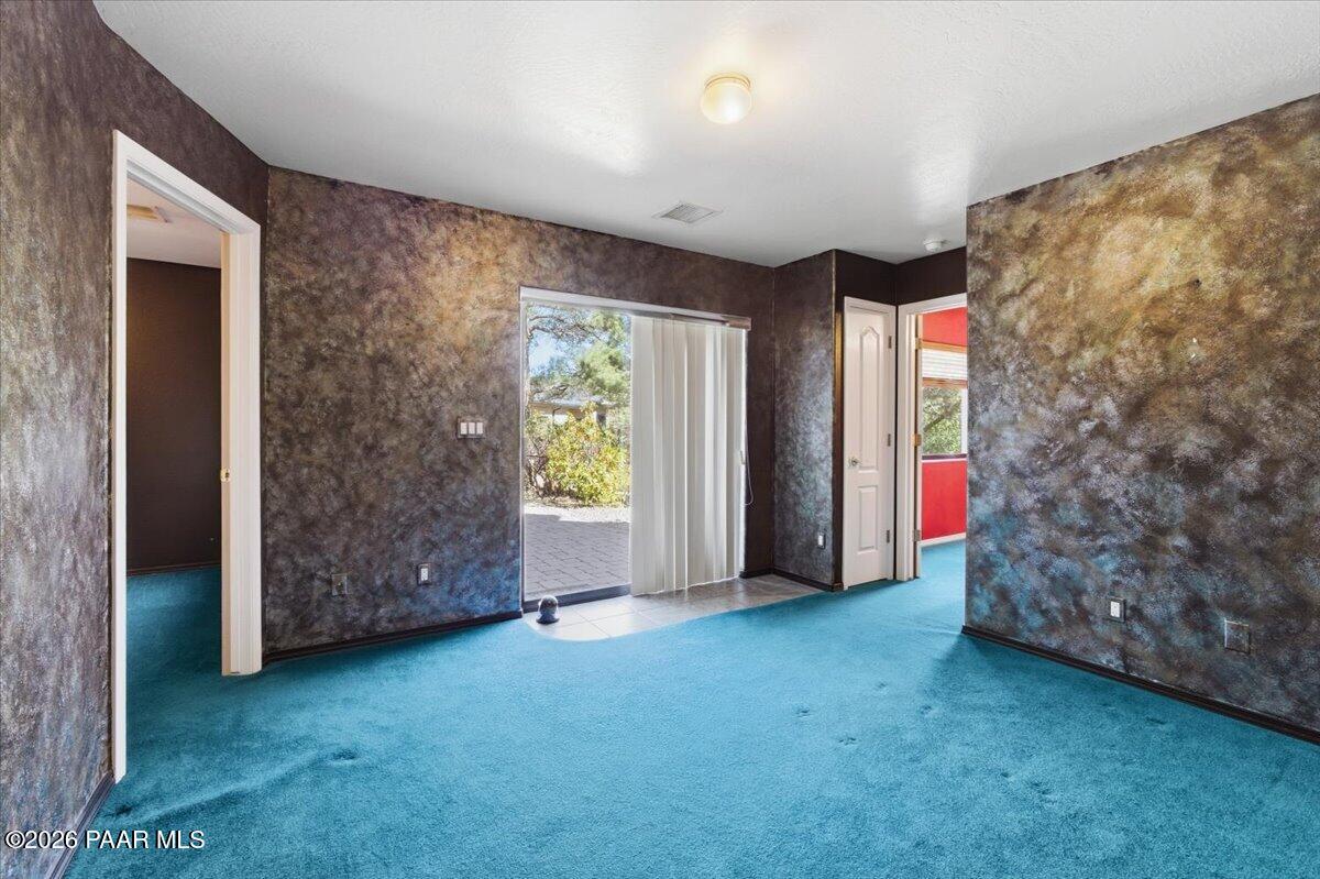 2101 Meander Prescott, AZ 86305 - Photo 15 of 22 an empty room with windows and closet