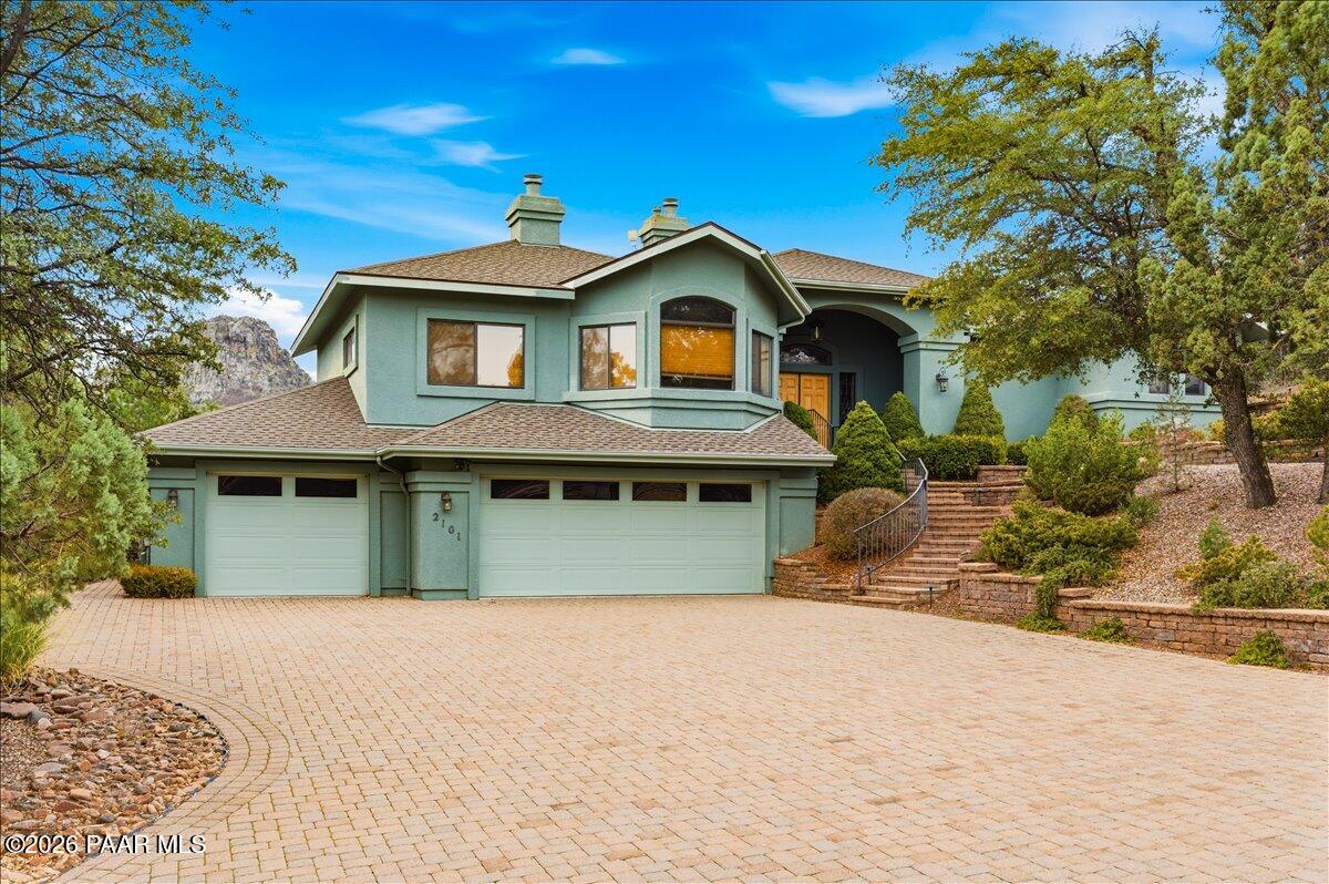 2101 Meander Prescott, AZ 86305 - Photo 2 of 22 a front view of a house with a yard