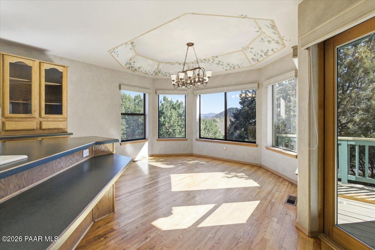 2101 Meander Prescott, AZ 86305 - Photo 5 of 22 a large hall with wooden floor and windows