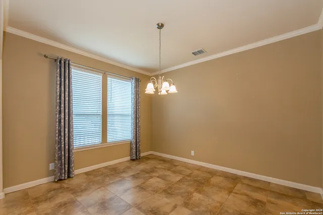 a bathroom with a granite countertop sink a large mirror and a shower