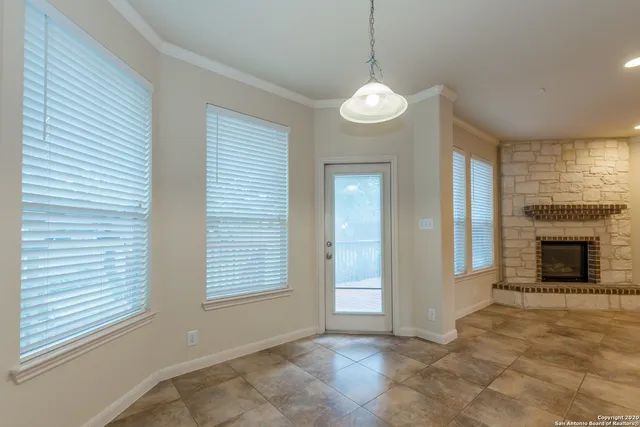 a large kitchen with stainless steel appliances kitchen island granite countertop a large counter top and stove