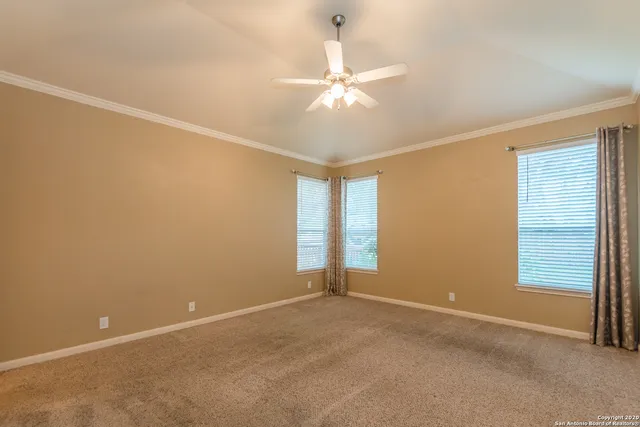 a bathroom with a tub and shower