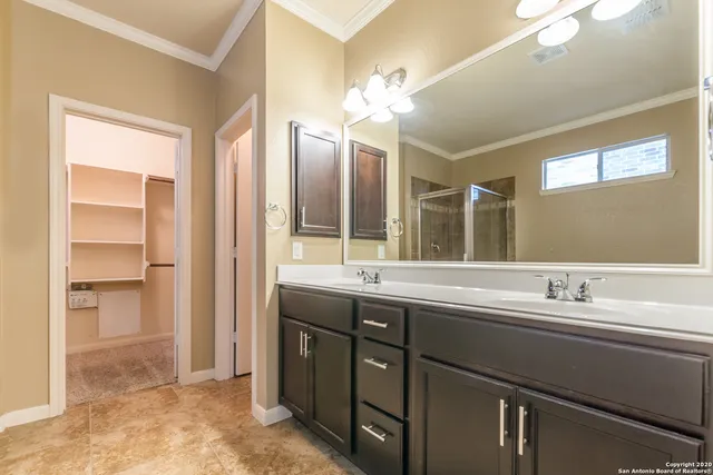 a bathroom with a bathtub and a sink