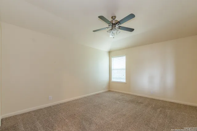 a view of a livingroom with a ceiling fan