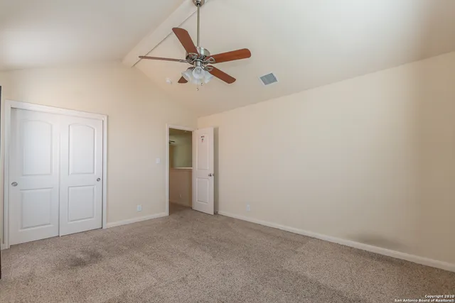 a view of a balcony with wooden floor