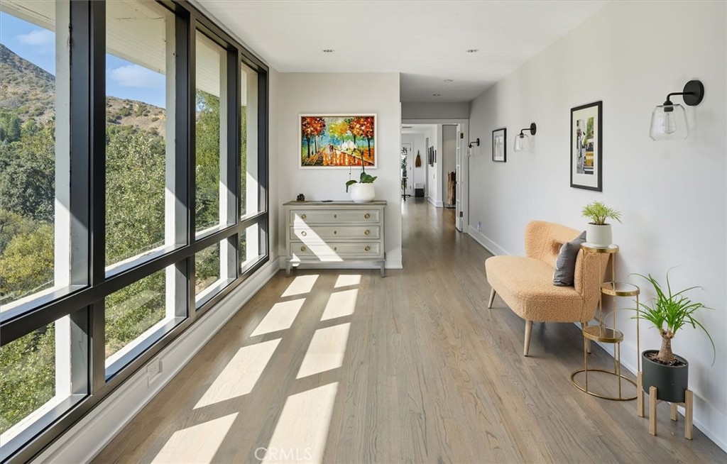 28933 Wagon Road Agoura Hills, CA 91301 - Photo 12 of 73 a living room with furniture and a large window