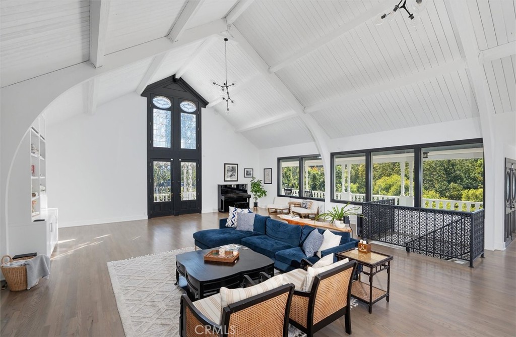 28933 Wagon Road Agoura Hills, CA 91301 - Photo 15 of 73 a living room with furniture and a large window
