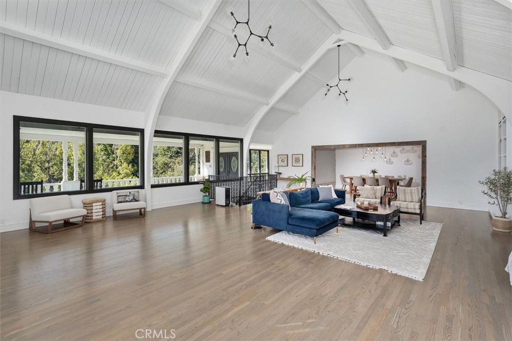 28933 Wagon Road Agoura Hills, CA 91301 - Photo 16 of 73 a living room with furniture and a large window