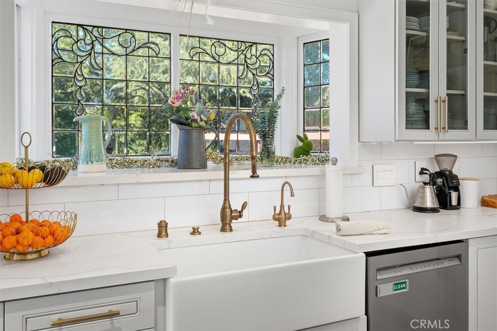 28933 Wagon Road Agoura Hills, CA 91301 - Photo 25 of 73 a kitchen with a sink and a window