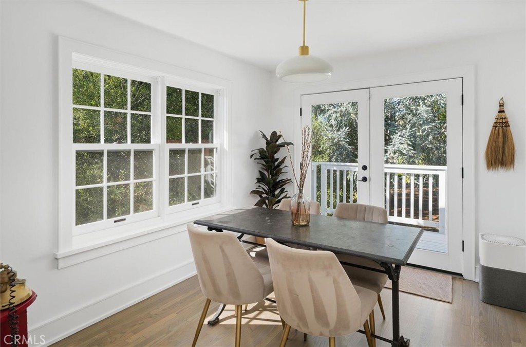 28933 Wagon Road Agoura Hills, CA 91301 - Photo 27 of 73 a view of a dining room with furniture window and wooden floor