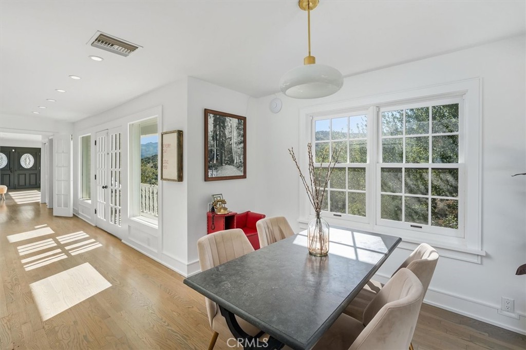 28933 Wagon Road Agoura Hills, CA 91301 - Photo 28 of 73 a view of a dining room with furniture and wooden floor