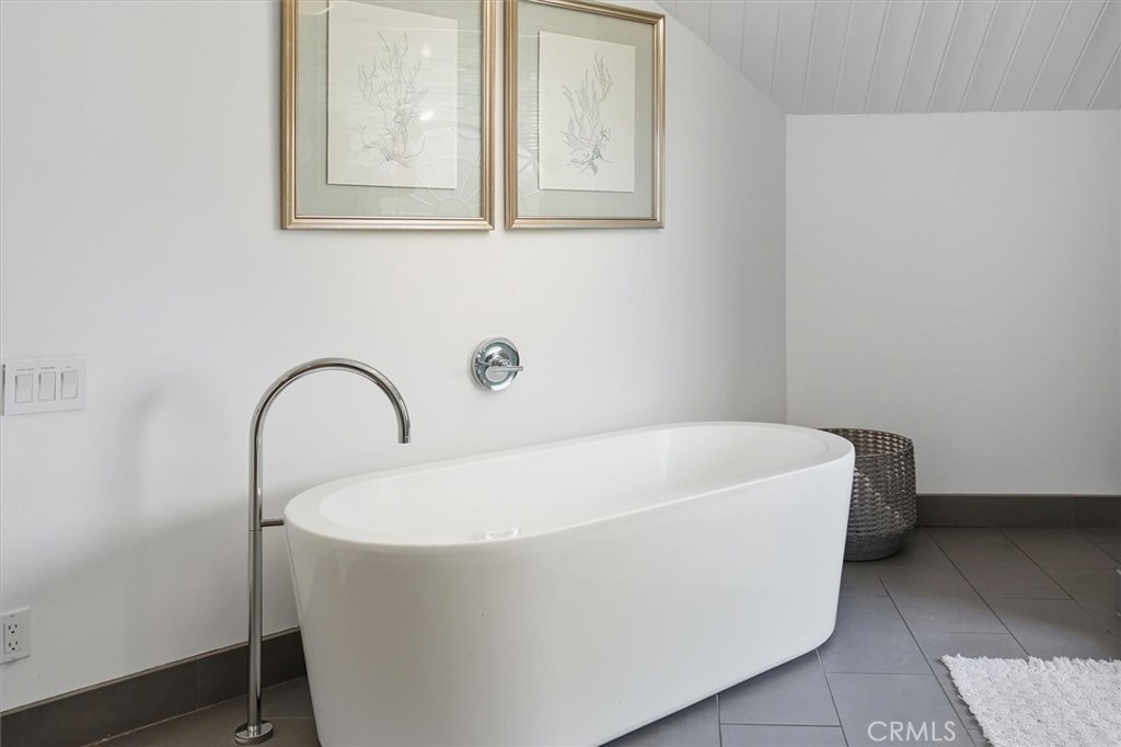 28933 Wagon Road Agoura Hills, CA 91301 - Photo 36 of 73 a white bath tub sitting in a bathroom
