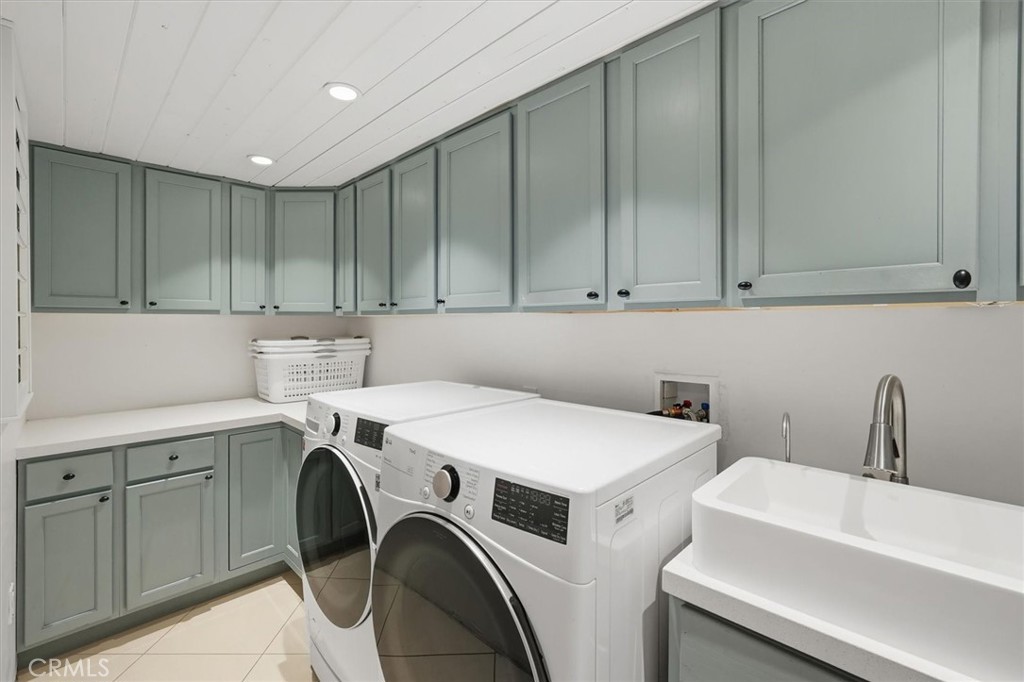 28933 Wagon Road Agoura Hills, CA 91301 - Photo 51 of 73 a utility room with dryer and washer